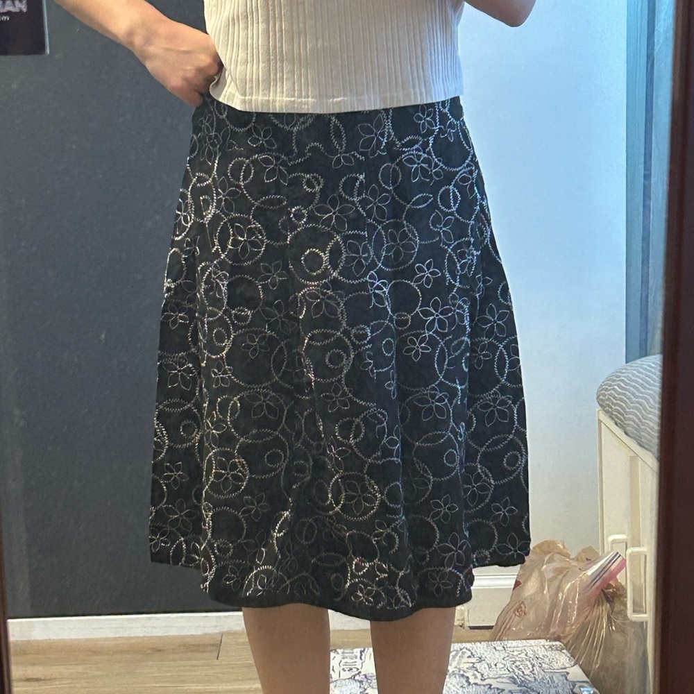 Black midi skirt with white floral embroidery